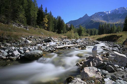 Hiking by the river in Peisey-Vallandry France
